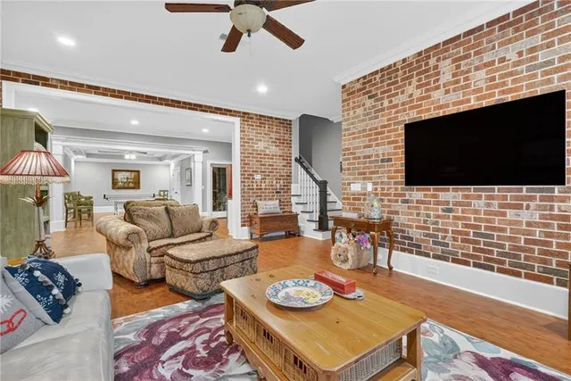 a kitchen with granite countertop a stove and white cabinets
