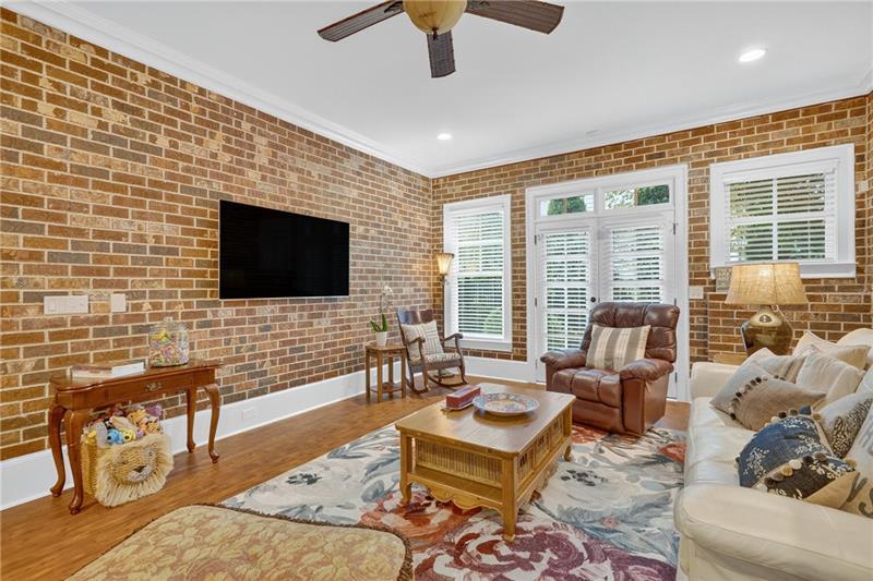 3100 Rhodenhaven Drive Northwest Atlanta, GA 30327 - Photo 41 of 52 a living room with furniture and a flat screen tv