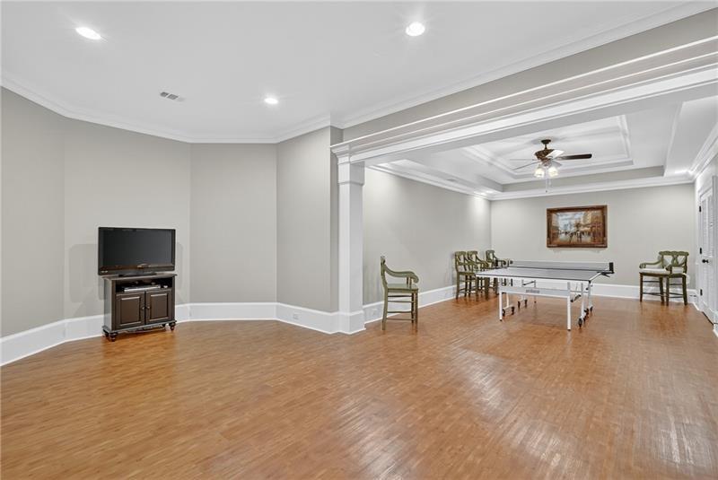3100 Rhodenhaven Drive Northwest Atlanta, GA 30327 - Photo 44 of 52 a view of a livingroom with furniture and a flat screen tv
