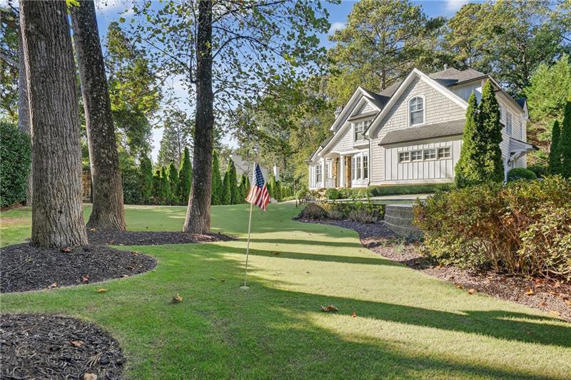 3100 Rhodenhaven Drive Northwest Atlanta, GA 30327 - Photo 48 of 52 a front view of a house with a yard