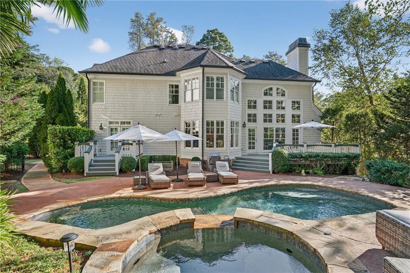 3100 Rhodenhaven Drive Northwest Atlanta, GA 30327 - Photo 51 of 52 a house with garden in front of it