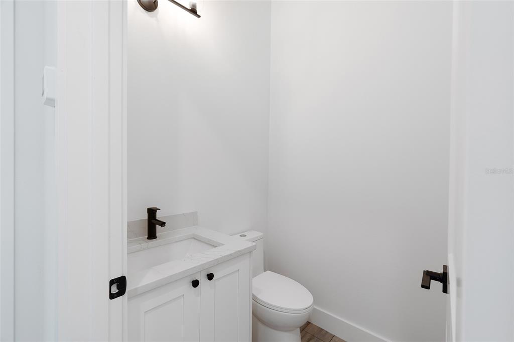 210 Tournament Road Rotonda West, FL 33947 - Photo 37 of 59 a bathroom with a toilet