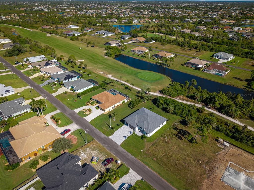 210 Tournament Road Rotonda West, FL 33947 - Photo 51 of 59 an aerial view of residential houses with outdoor space