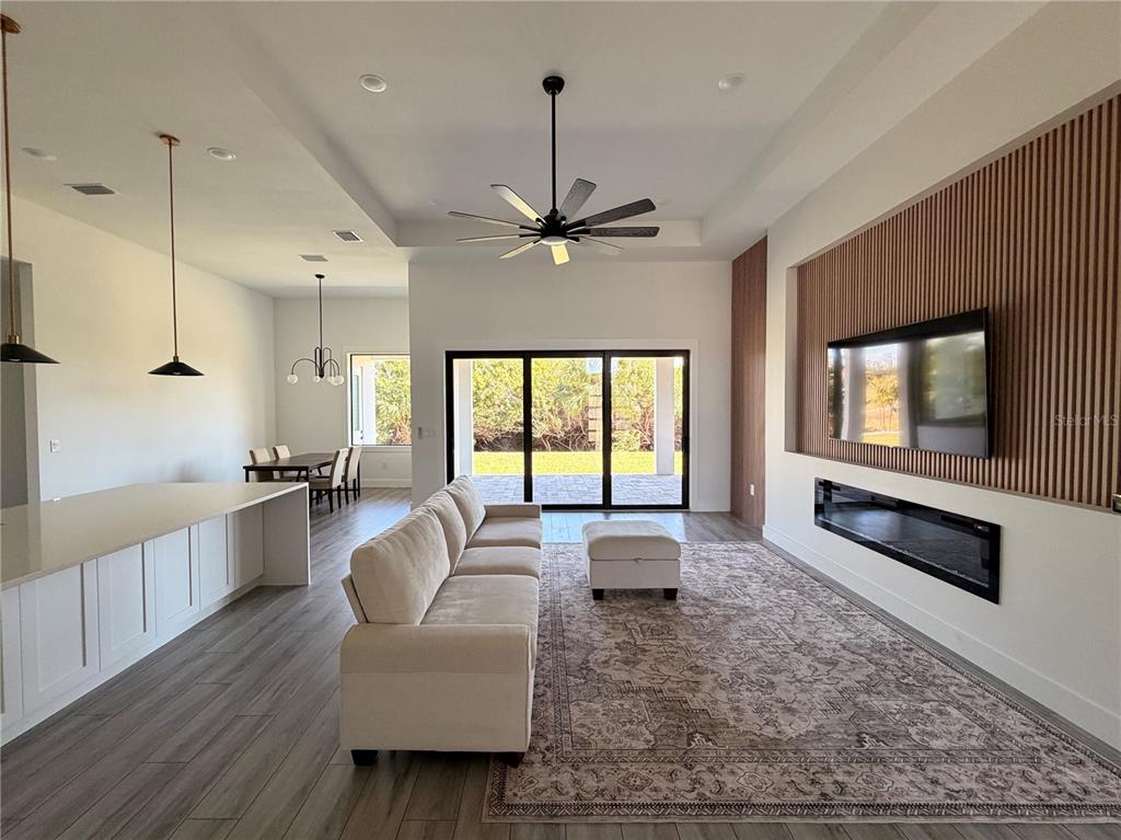 210 Tournament Road Rotonda West, FL 33947 - Photo 6 of 59 a living room with furniture and a window