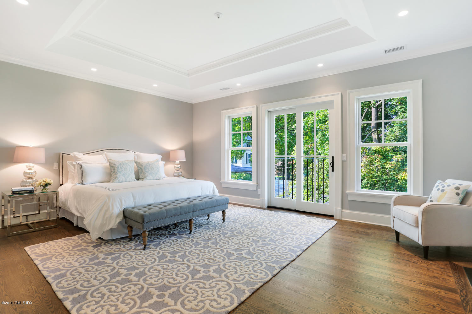 3 Juniper Lane Riverside, CT 06878 - Photo 14 of 30 a spacious bedroom with a bed and glass window