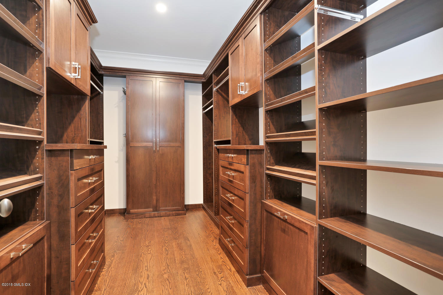 3 Juniper Lane Riverside, CT 06878 - Photo 17 of 30 a view of walk in closet with clothes and shoes