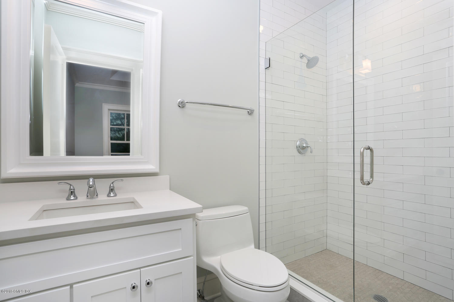 3 Juniper Lane Riverside, CT 06878 - Photo 19 of 30 a bathroom with a sink a toilet and shower