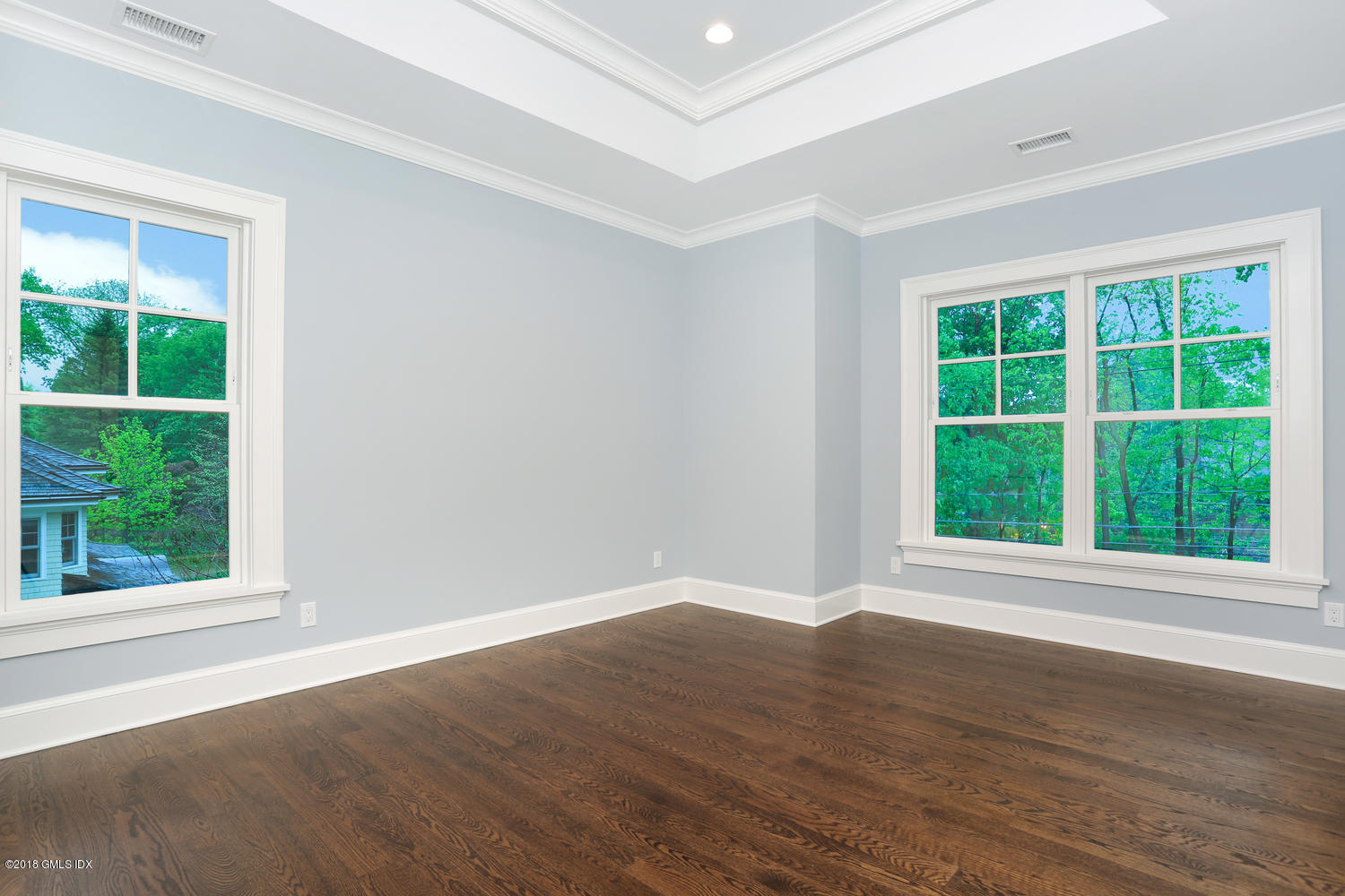 3 Juniper Lane Riverside, CT 06878 - Photo 20 of 30 a view of an empty room with wooden floor and a window
