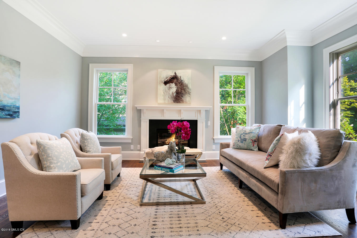 3 Juniper Lane Riverside, CT 06878 - Photo 3 of 30 a living room with furniture and a fireplace