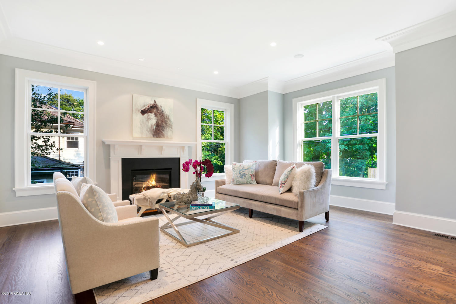 3 Juniper Lane Riverside, CT 06878 - Photo 4 of 30 a living room with furniture and a fireplace