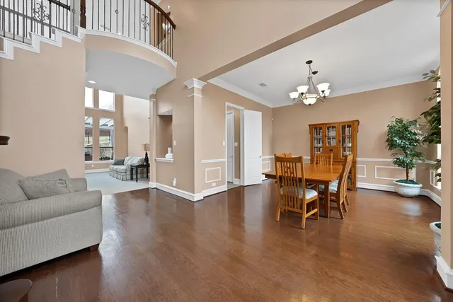 a view of a livingroom with furniture and wooden floor