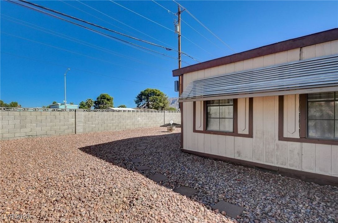 5576 Aldama Road Las Vegas, NV 89122 - Photo 23 of 23 View of fenced backyard