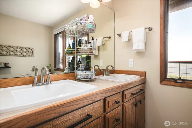 a living room with furniture and large window