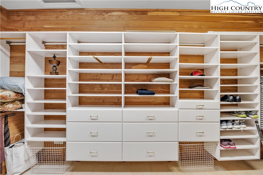 891 Olde Charter Circle Jefferson, NC 28640 - Photo 25 of 49 a view of walk in closet with empty racks