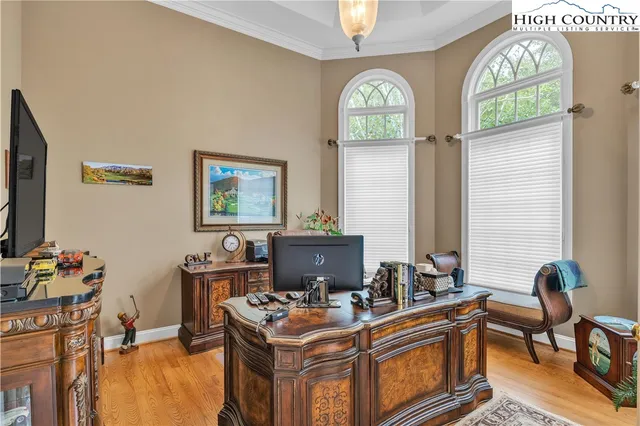 a workspace with furniture and a window