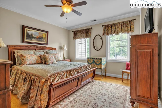 a bed room with a bed and a window