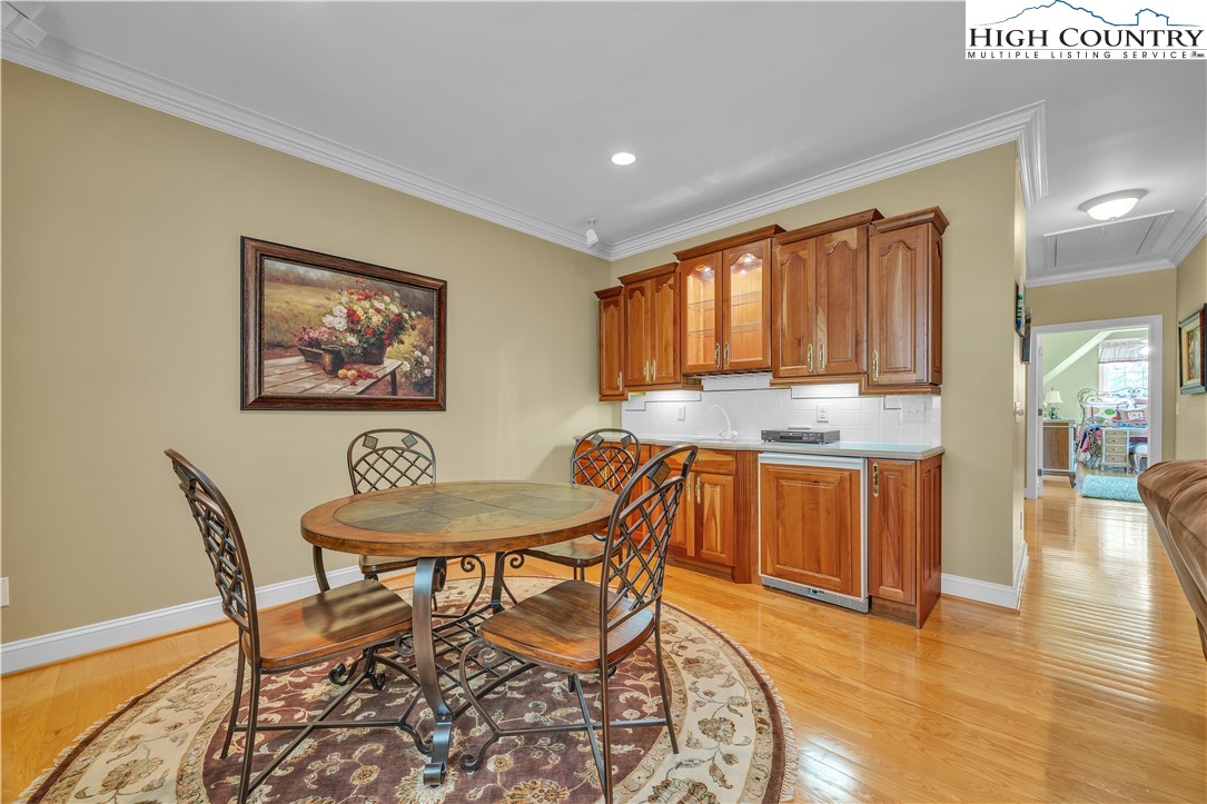 891 Olde Charter Circle Jefferson, NC 28640 - Photo 37 of 49 a dining room with furniture and wooden floor
