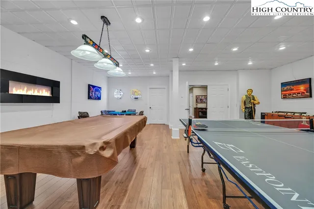 a room with furniture and a flat screen tv