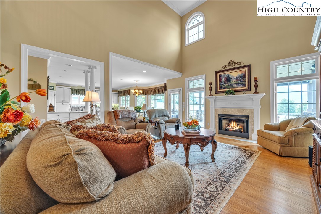 891 Olde Charter Circle Jefferson, NC 28640 - Photo 8 of 49 a living room with furniture fireplace and a fireplace
