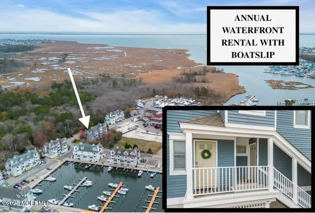 a view of a lake with a building in the background