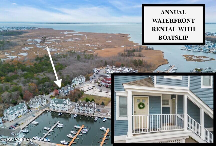 336 Lacey Road, Unit 36 Forked River, NJ 08731 - Photo 1 of 44 a view of a lake with a building in the background