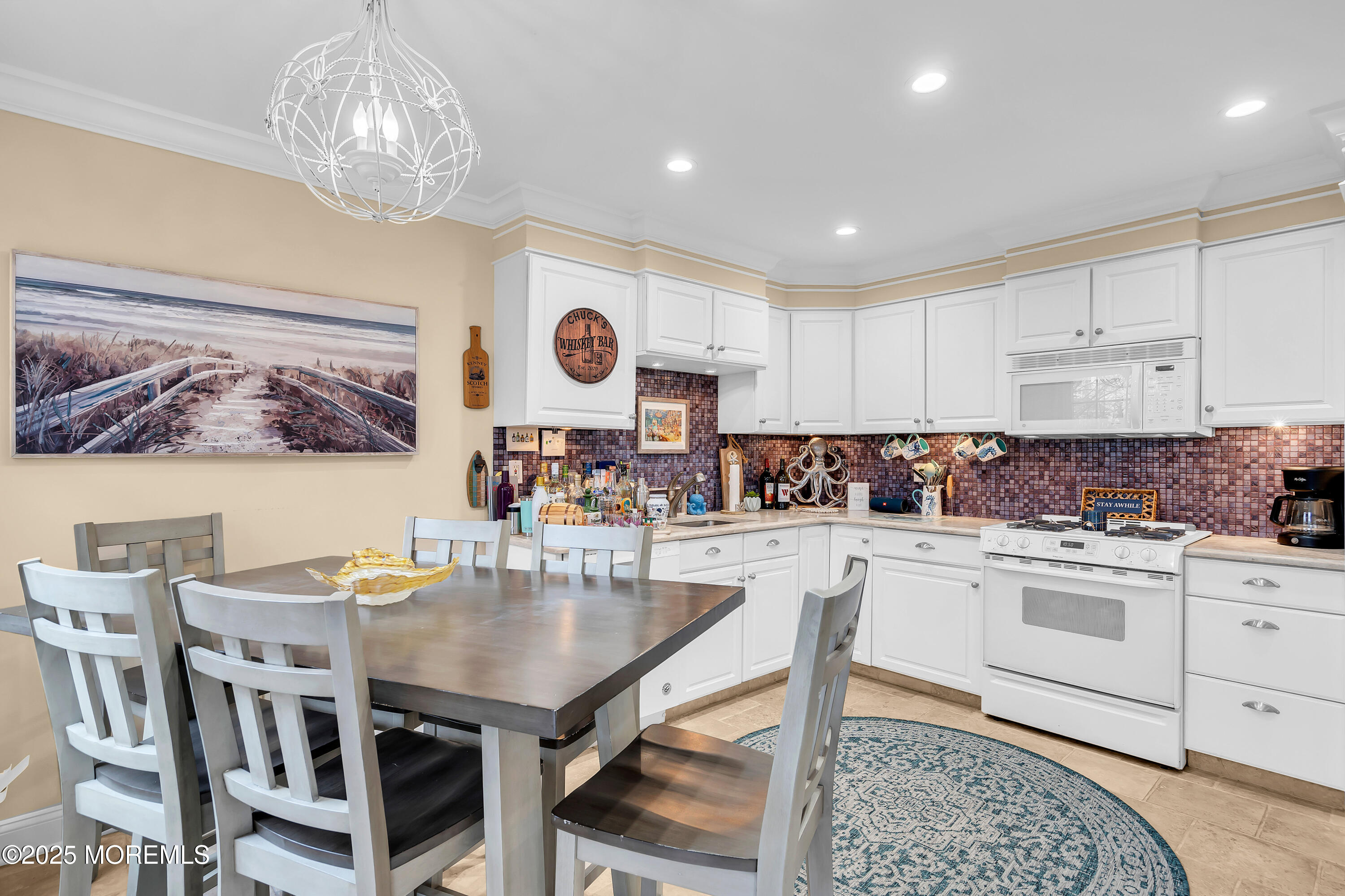336 Lacey Road, Unit 36 Forked River, NJ 08731 - Photo 12 of 44 a kitchen with a table and chairs in it