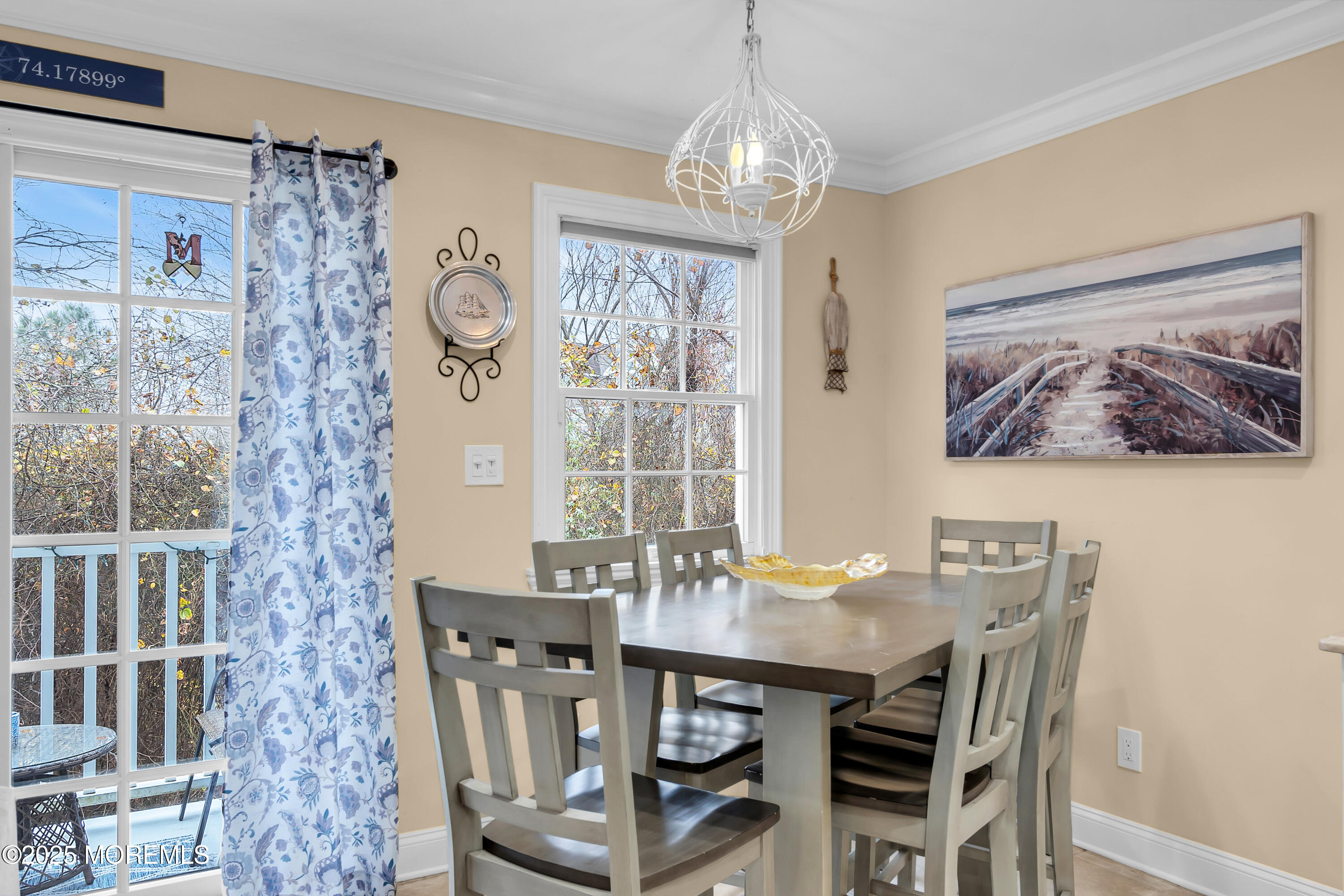 336 Lacey Road, Unit 36 Forked River, NJ 08731 - Photo 13 of 44 a view of a dining room with furniture large window and wooden floor