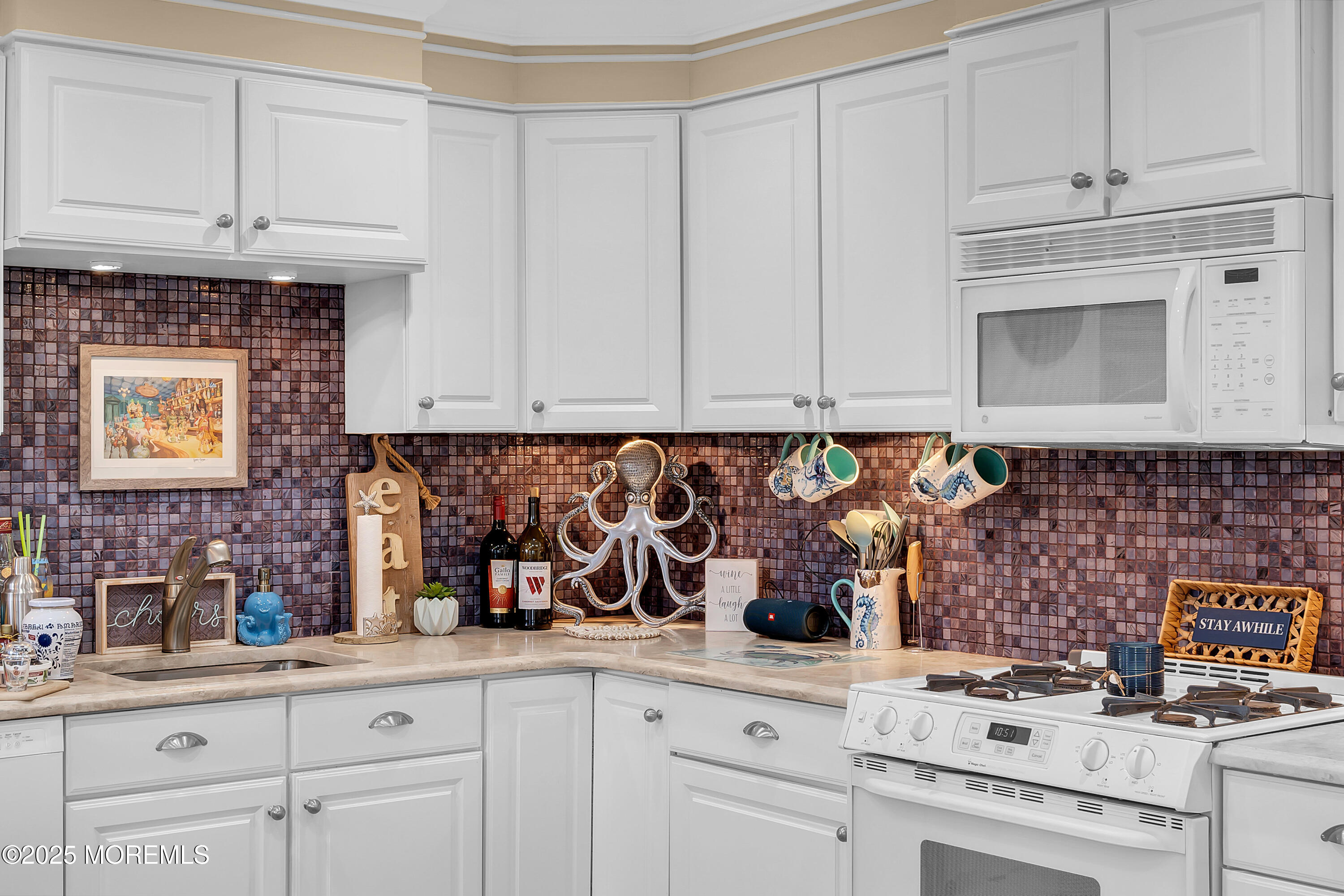 336 Lacey Road, Unit 36 Forked River, NJ 08731 - Photo 14 of 44 a kitchen with white cabinets and white appliances