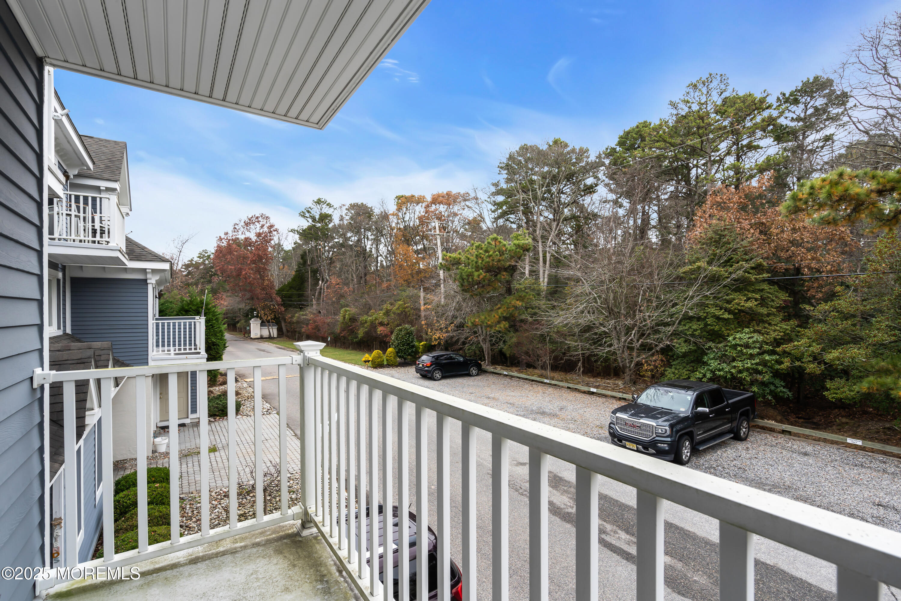 336 Lacey Road, Unit 36 Forked River, NJ 08731 - Photo 22 of 44 a view of a house with backyard and trees