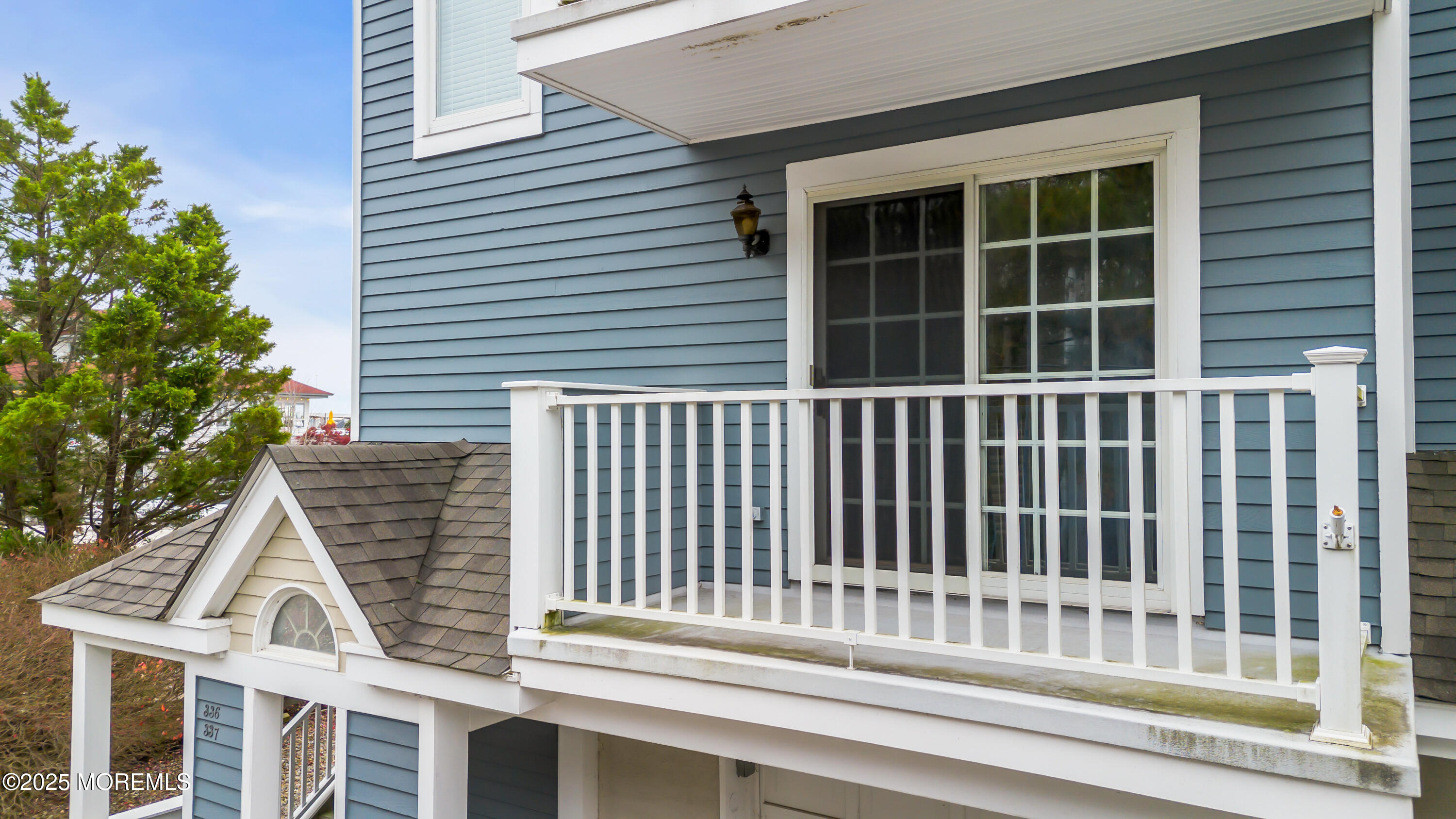 336 Lacey Road, Unit 36 Forked River, NJ 08731 - Photo 3 of 44 a view of a brick house with large windows