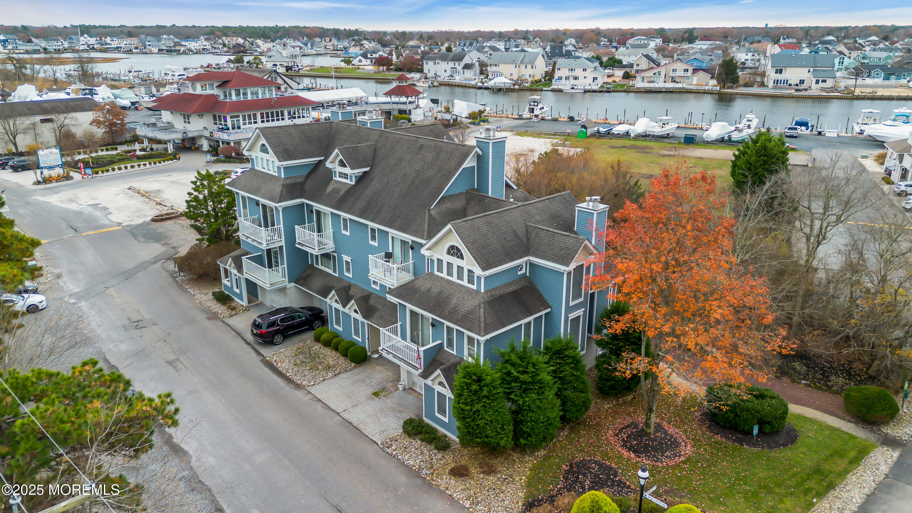 336 Lacey Road, Unit 36 Forked River, NJ 08731 - Photo 40 of 44 an aerial view of a house with a lake view