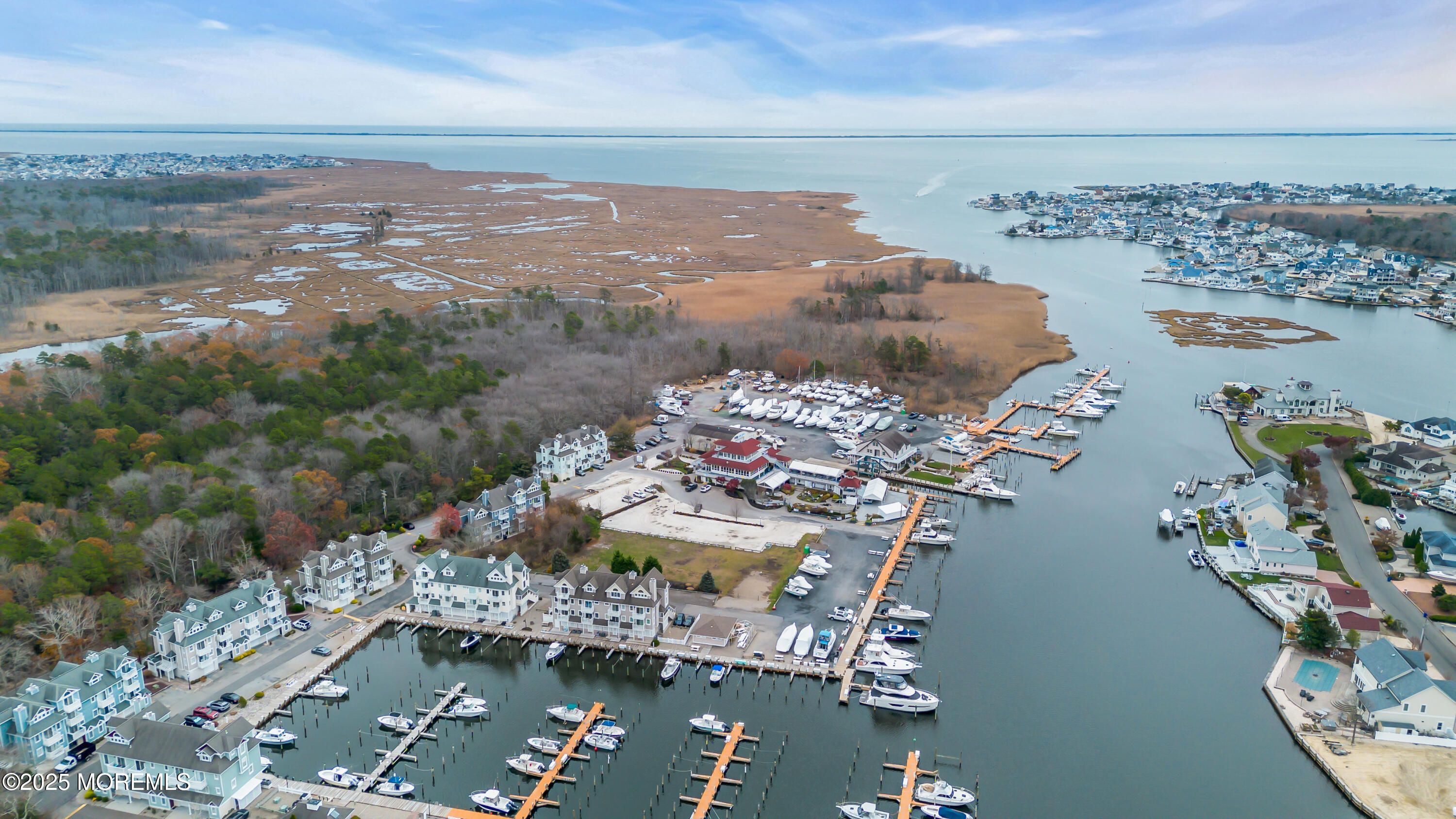 336 Lacey Road, Unit 36 Forked River, NJ 08731 - Photo 41 of 44 a view of a city with an ocean beach