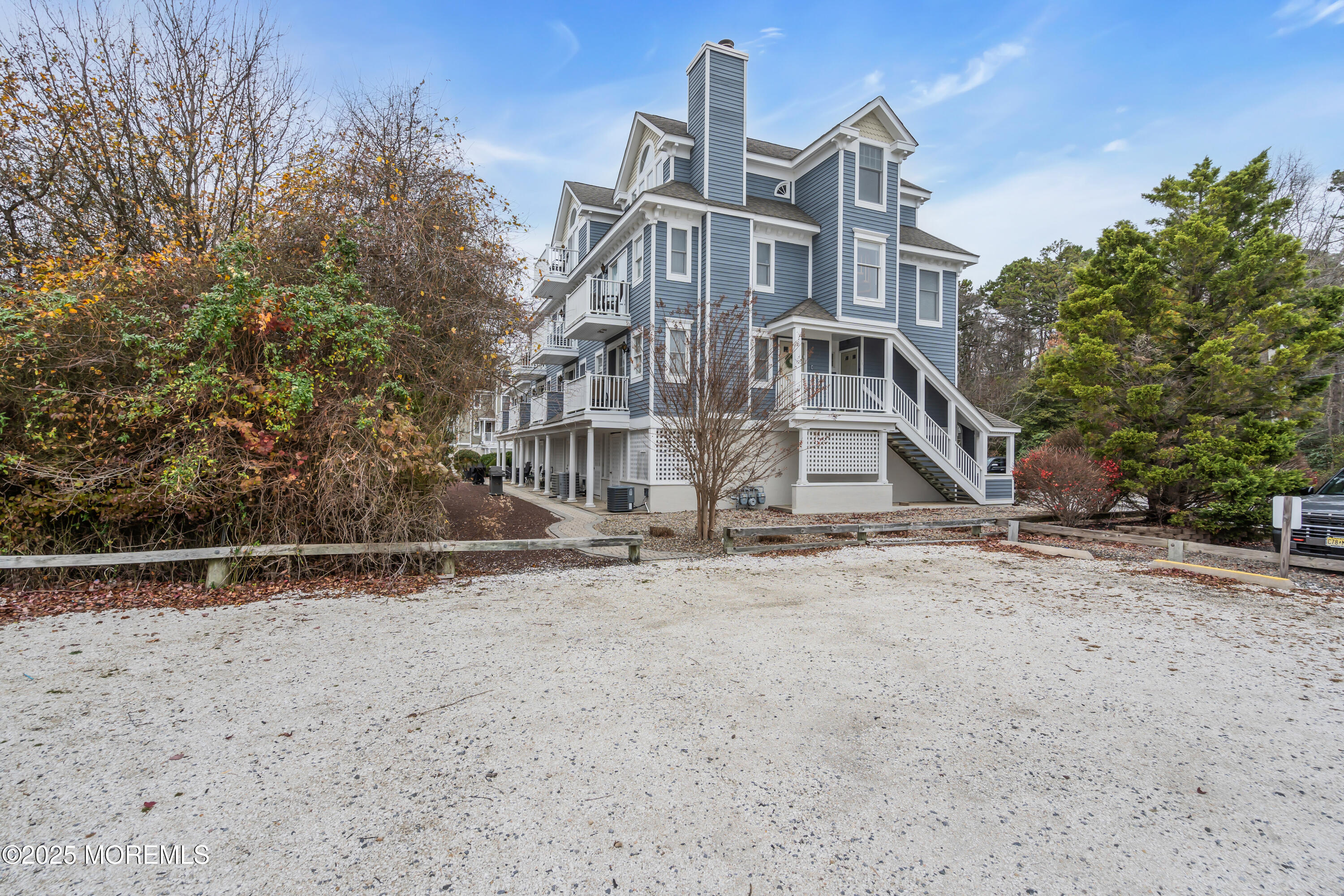 336 Lacey Road, Unit 36 Forked River, NJ 08731 - Photo 5 of 44 front view of a house with a yard