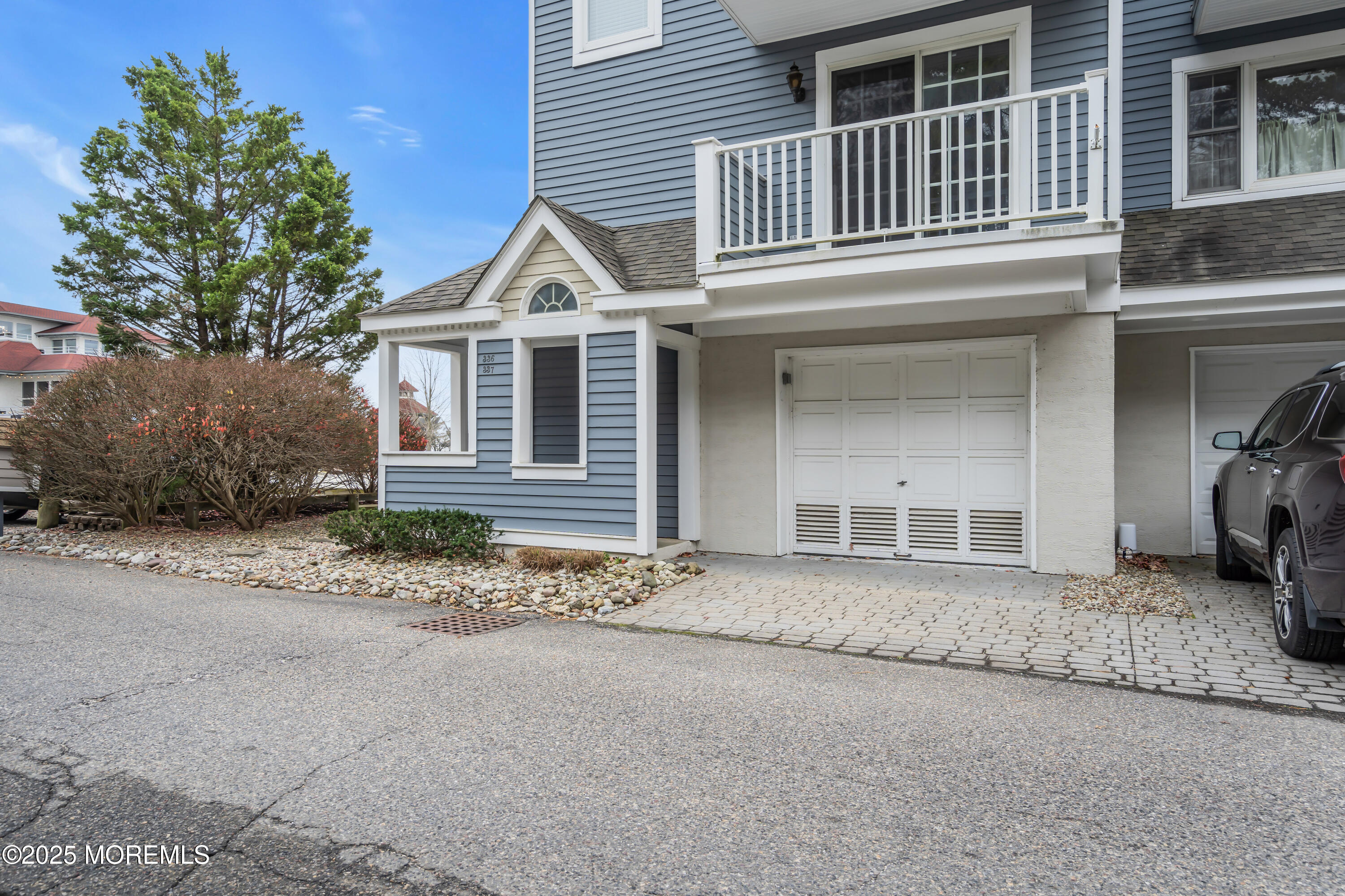 336 Lacey Road, Unit 36 Forked River, NJ 08731 - Photo 6 of 44 front view of a house with a yard