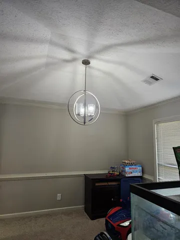 a view of livingroom with furniture and windows