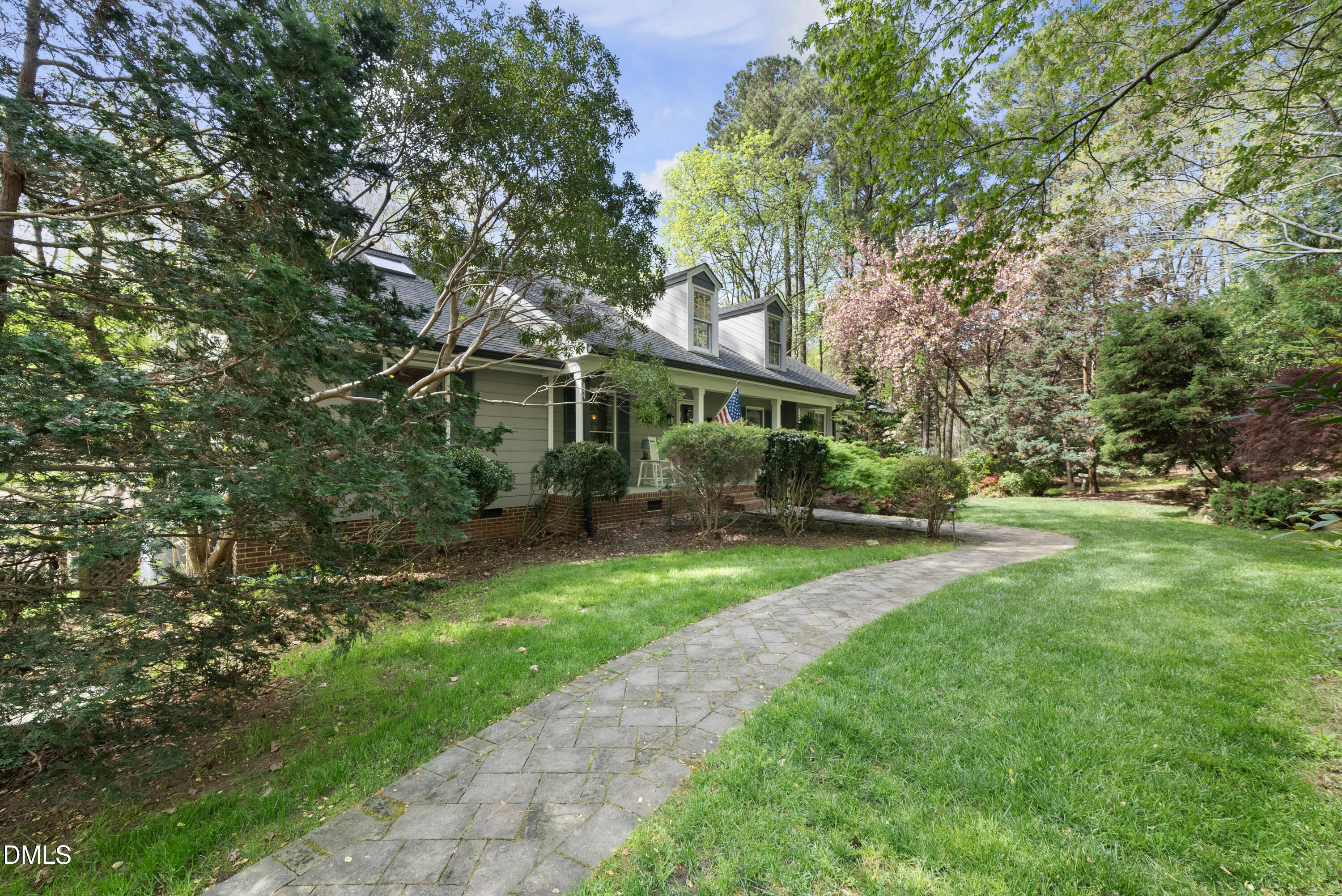 6200 Splitrock Trail Apex, NC 27539 - Photo 51 of 64 a front view of a house with garden