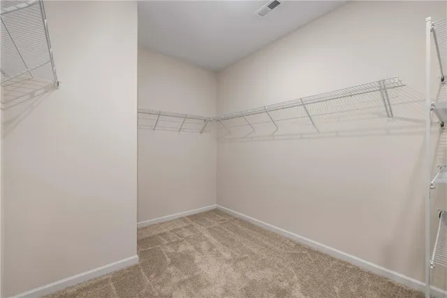 a view of a room with racks on the wall