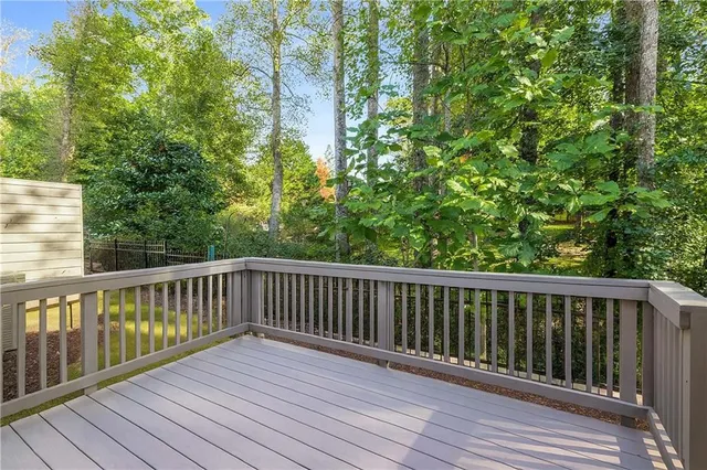a view of balcony with wooden floor