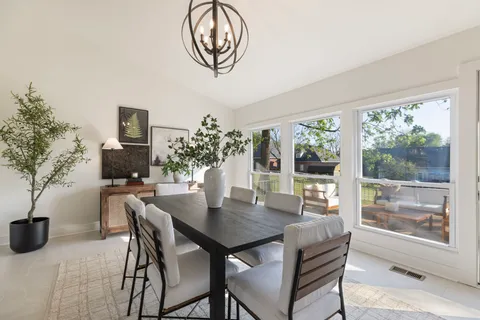 a outdoor space with patio furniture and wooden floor