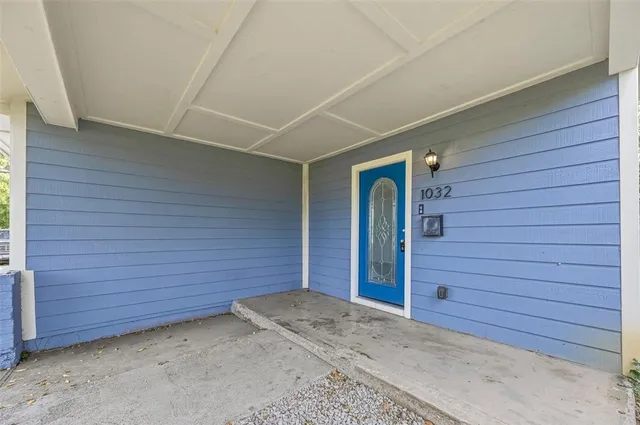 a brick house with a backyard