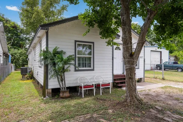 front view of a house with a yard