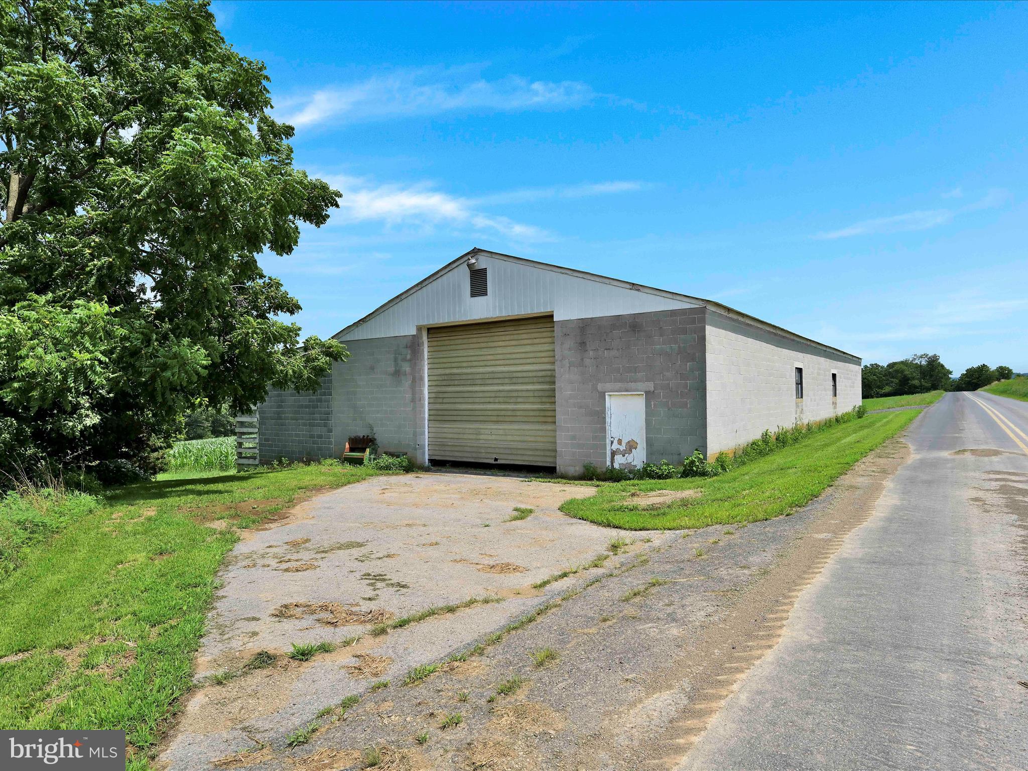 241 Mud Run Road Oley, PA 19547 - Photo 12 of 28 a front view of a house with a yard and garage
