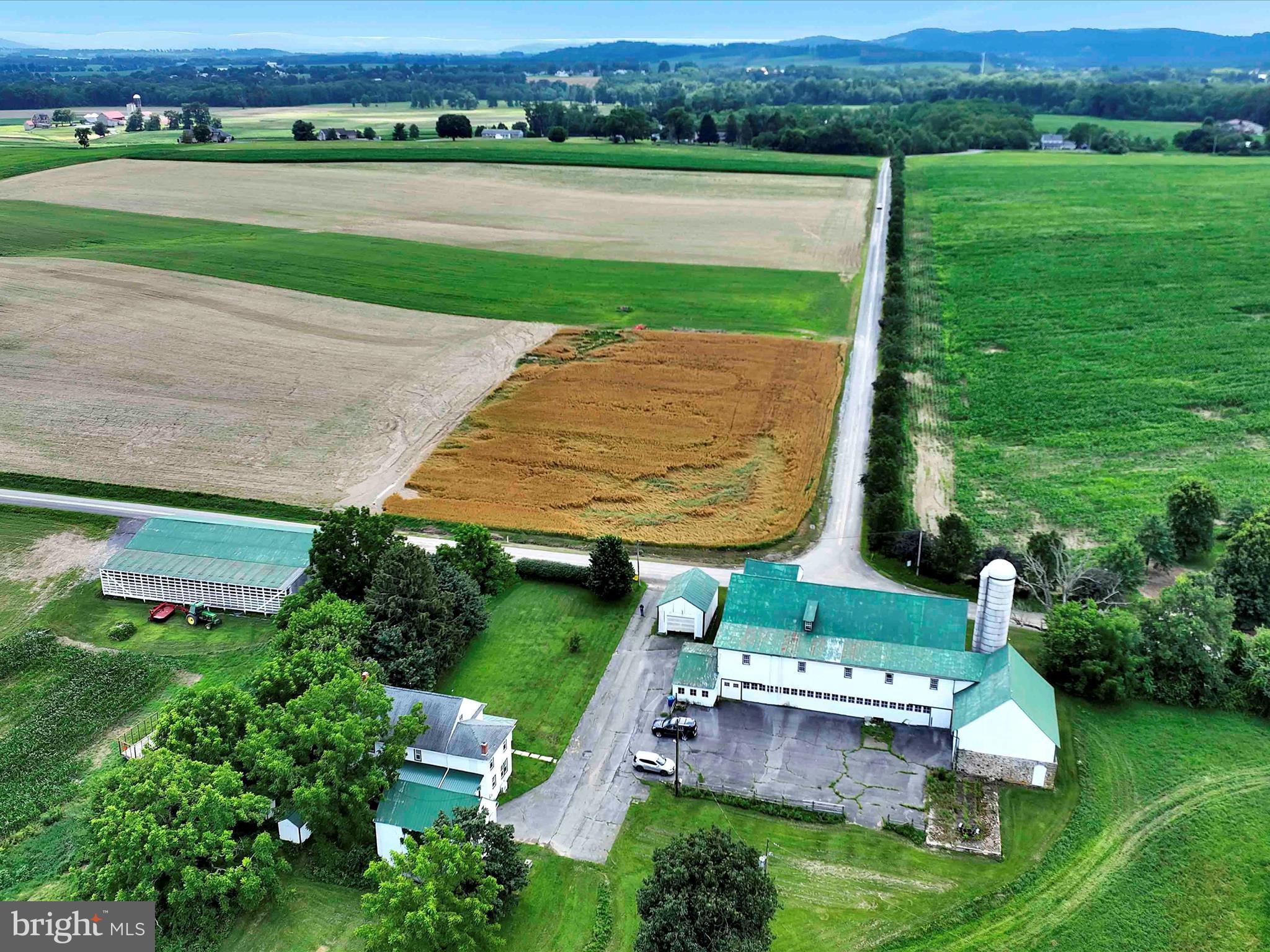 241 Mud Run Road Oley, PA 19547 - Photo 19 of 28 an aerial view of a house with pool garden and furniture
