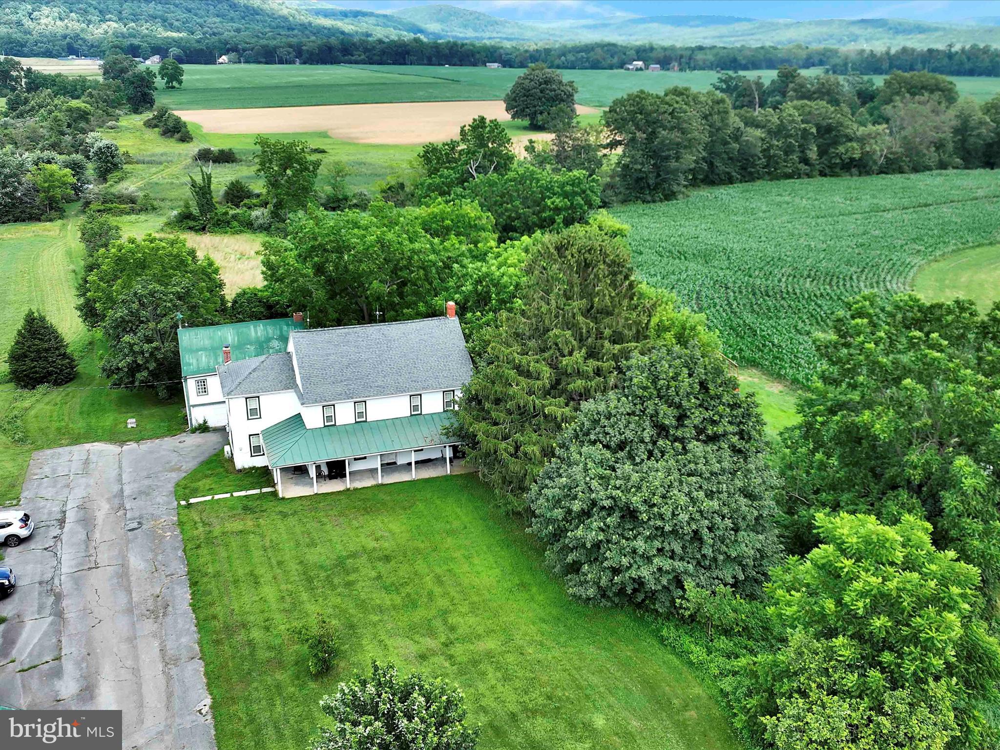 241 Mud Run Road Oley, PA 19547 - Photo 20 of 28 a view of a garden with lawn chairs