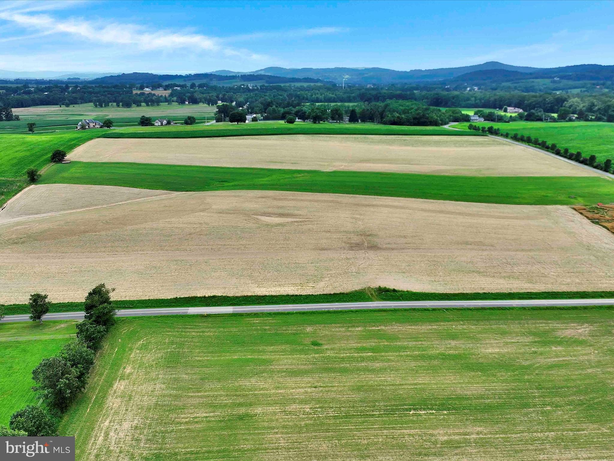 241 Mud Run Road Oley, PA 19547 - Photo 25 of 28 a view of a grassy field with mountains in the background