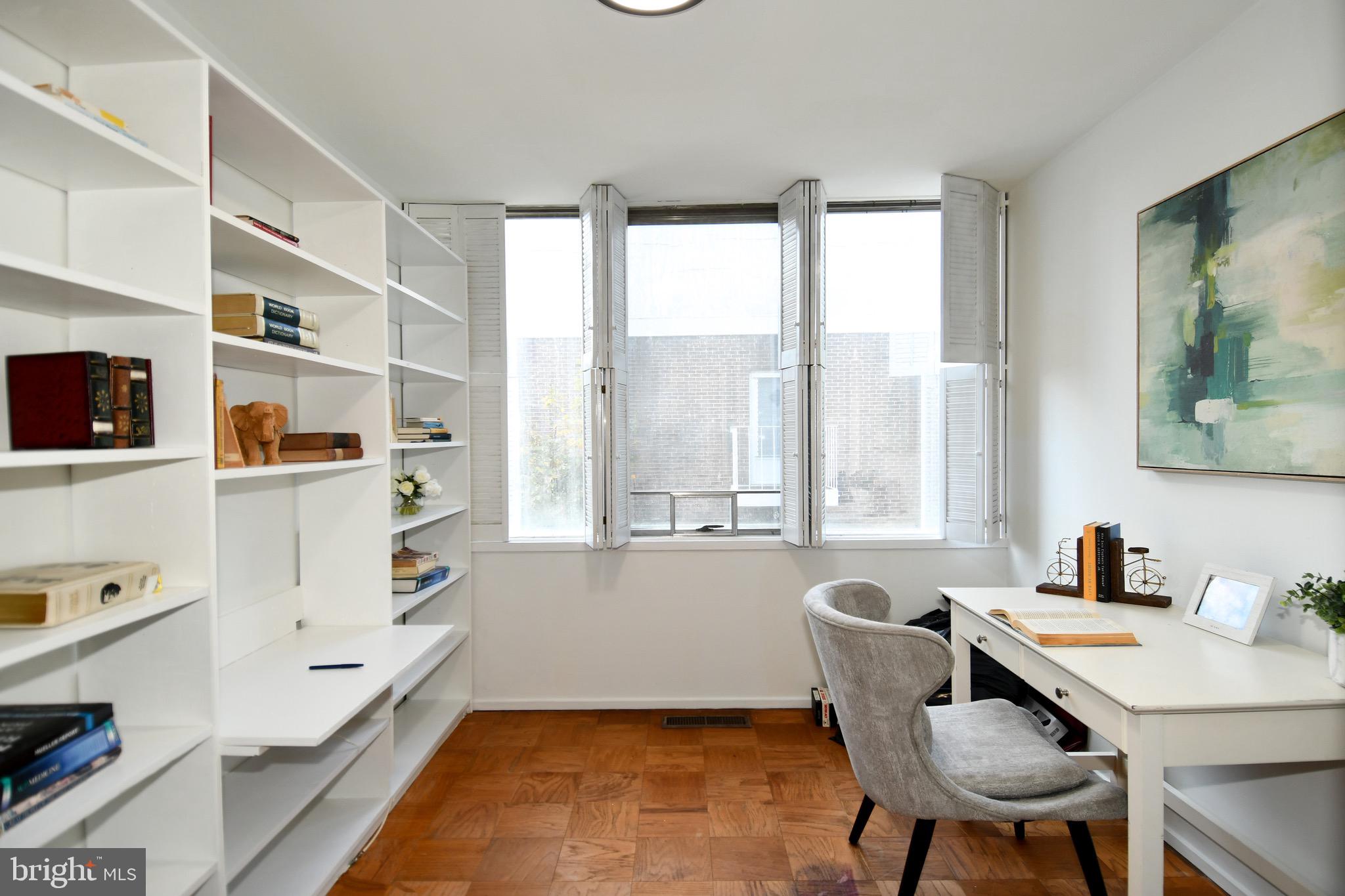 354 N Street Southwest, Unit 354 Washington, DC 20024 - Photo 28 of 48 a view of a workspace with furniture and a window