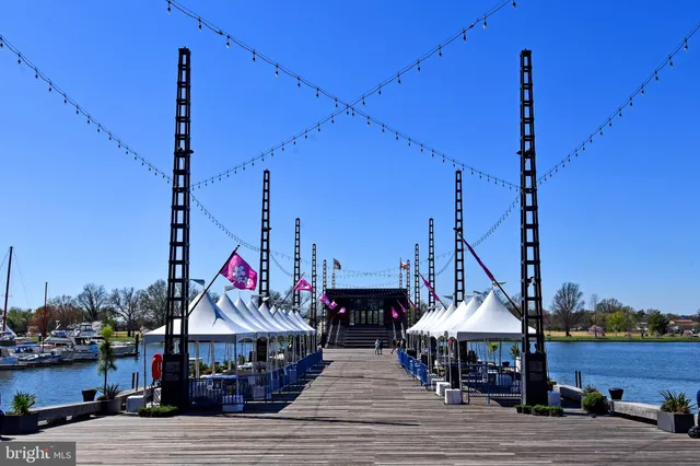 a childrens park with swings and table