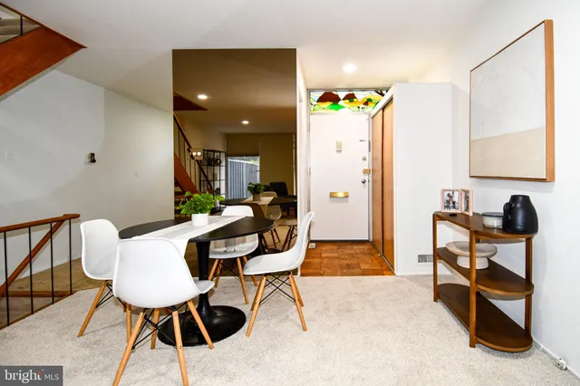 a view of walk in closet with rug