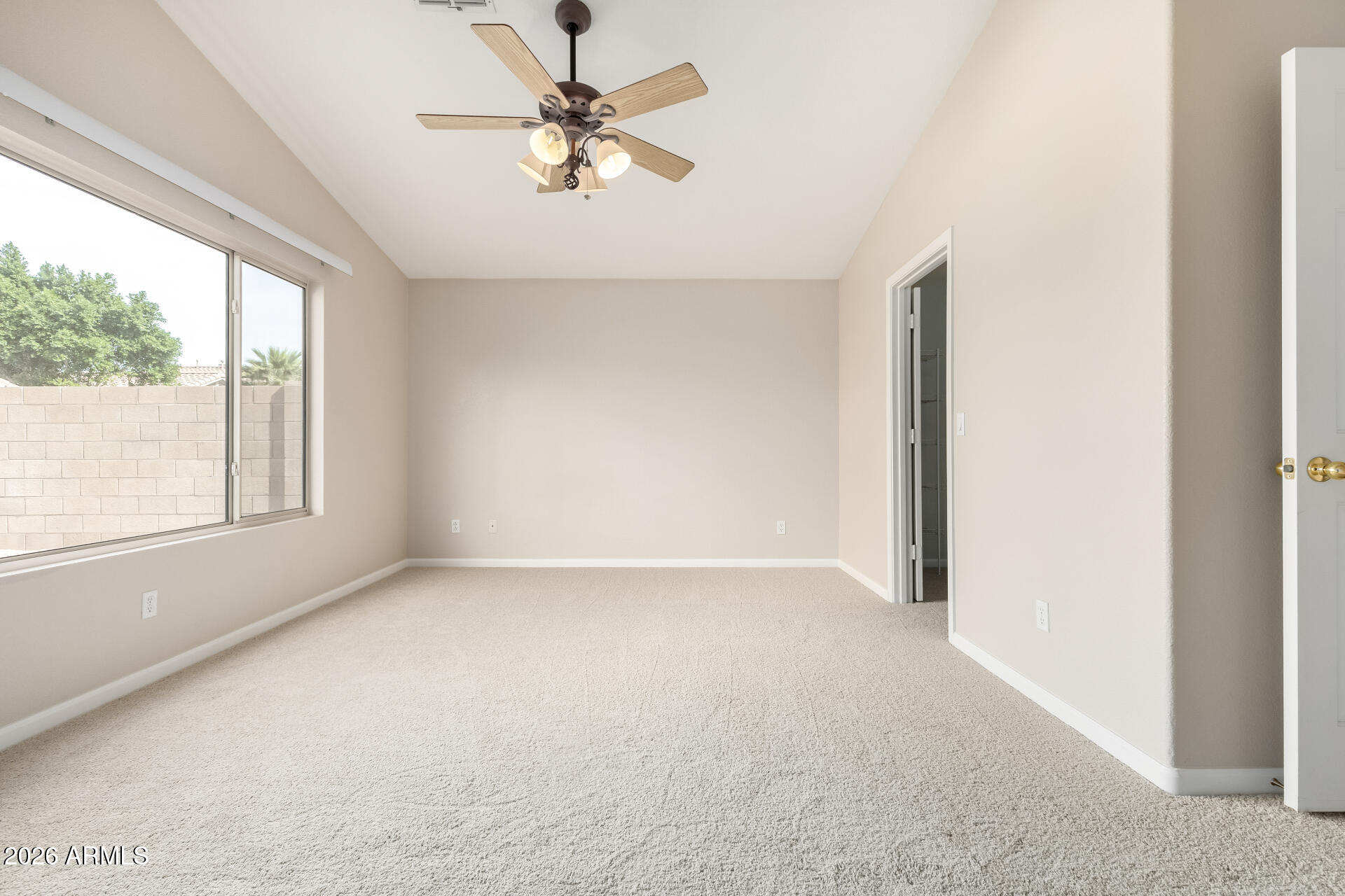 3136 East Desert Lane Gilbert, AZ 85234 - Photo 11 of 22 an empty room with a window