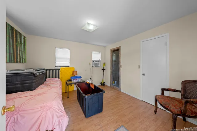 a bed room with a bed and furniture